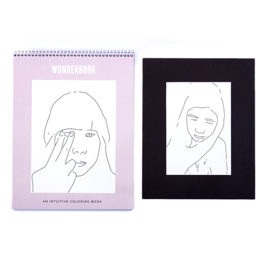 Cover of Coloring book called Wonderbook with one black matted print of line drawing with girl
