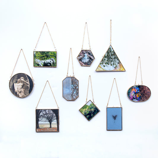 9 unique shaped frames with artistic images of nature title Wood U from Everyday Art Editions